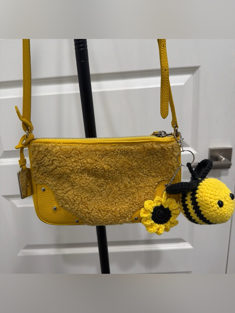 Coach Small Rhyder Pochette in Shearling (Banana) crossbody bag